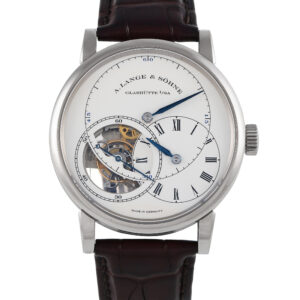 Finished to standard Lange perfection, the Richard Lange Tourbillon "Pour le Mérite" is unquestionably a breathtaking watch. It boasts a one-minute tourbillon and fusée-and-chain transmission that enables the watch to keep running at an exact rate. The technically impressive mechanism is housed on a 41.9mm case in 18K white gold, worn on an alligator leather strap. This timepiece's argenté-colored solid-silver dial presents a striking layout, with blued steel hands and overlapping sub-dials. This special edition model was only made available exclusively in Lange boutiques. This pre-owned A. Lange & Söhne Richard Lange Tourbillon "Pour le Mérite" 18K White Gold Men's Watch 760.026F comes with papers, an extra pair of leather straps, and the manufacturer's box.