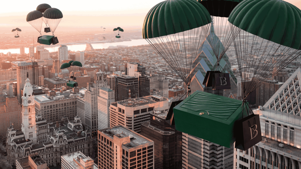 Philadelphia Center City Skyline with Rolex boxes and Luxury Bazaar shopping bags