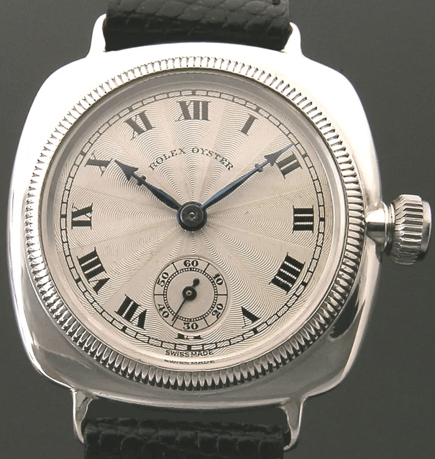 1920's Oyster with silver sunburst guilloche dial