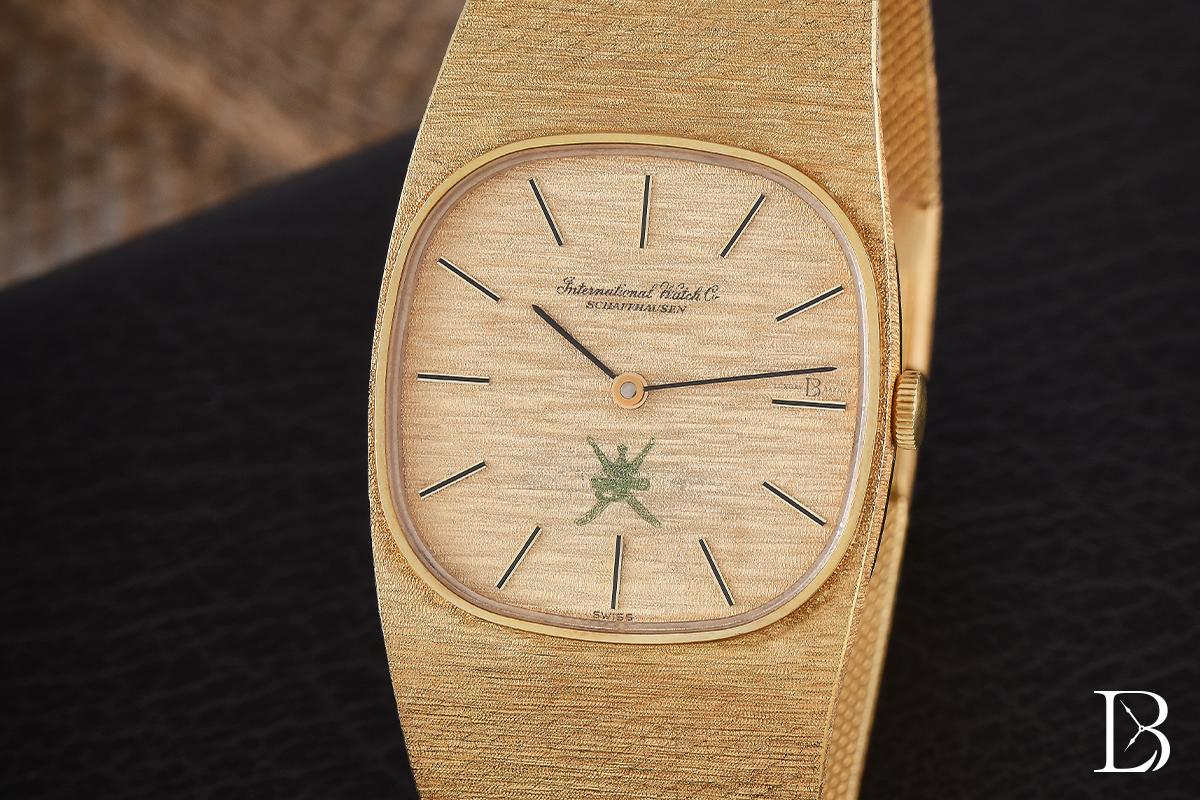 IWC Vintage Textured 18K Yellow Gold Khanjar Watch  with thin baton hour markers