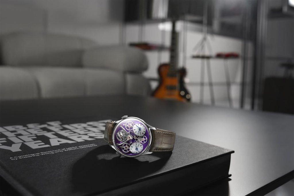 MB&F LMX Paris Edition Watch merchandised on book