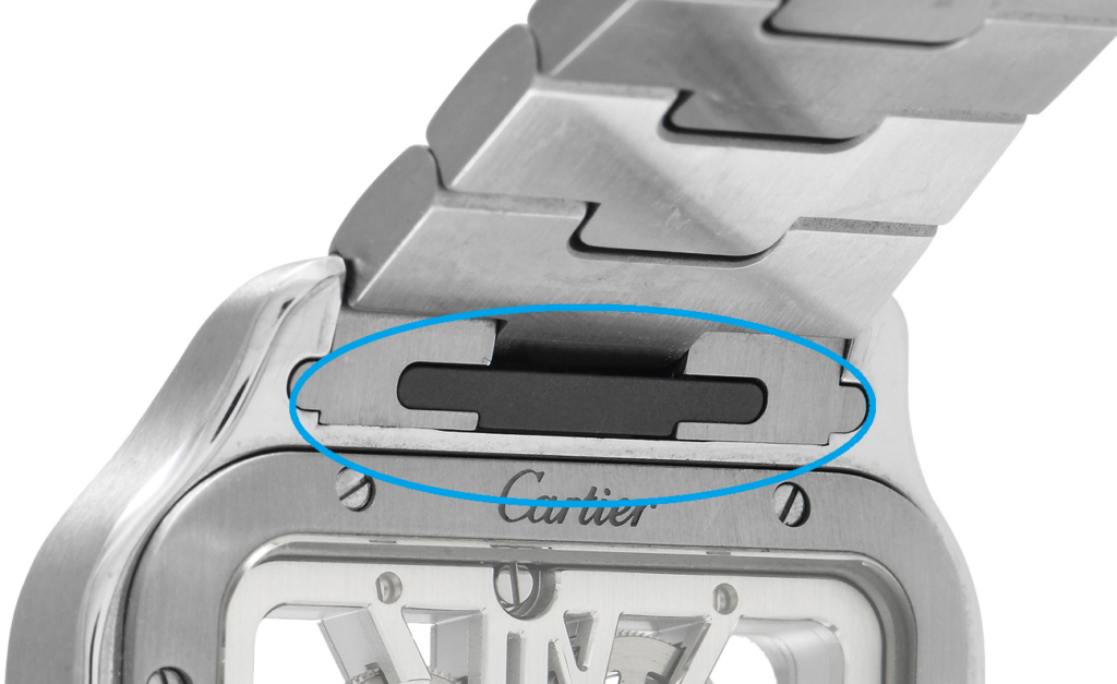 Easy-release button on the back of the Santos