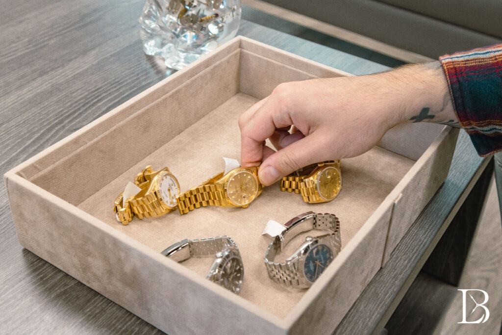 Luxury watches in a tray