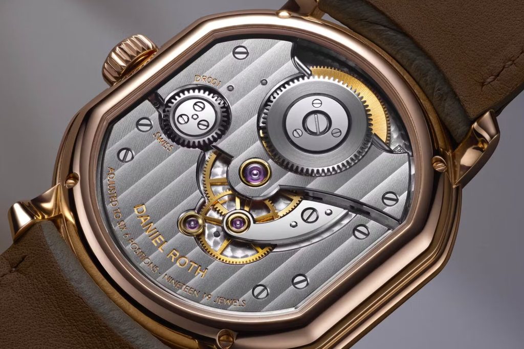 The 2024 Tourbillon Rose Gold model features an exhibition caseback