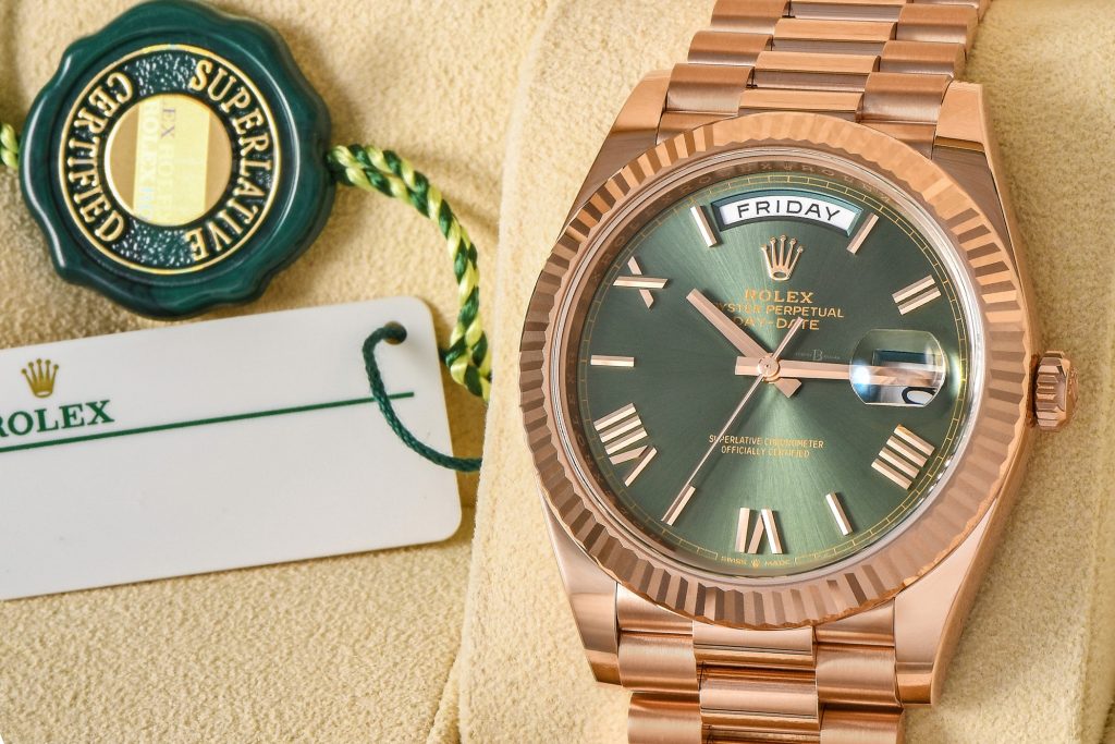 The Donald Trump Rolex Day-Date 40 is ref. 228235 with the popular olive green dial