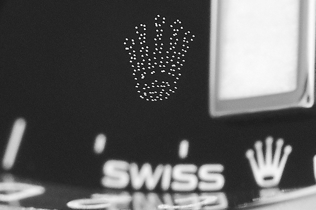 Rolex laser-etched crown on a 126610