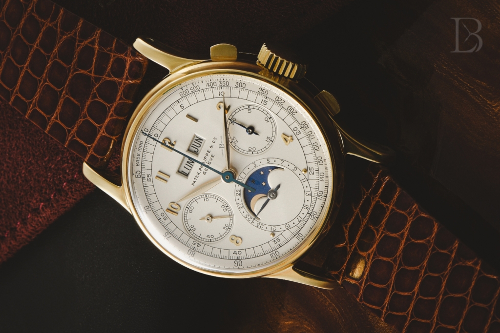 Yellow gold example on a leather strap