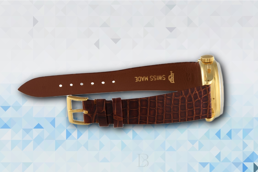 The Patek 1518 comes with a classic leather strap and tang buckle