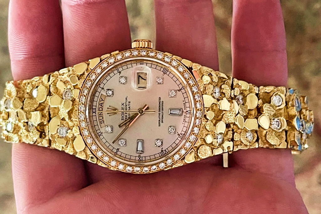 Custom Rolex with gold bracelet with diamonds
