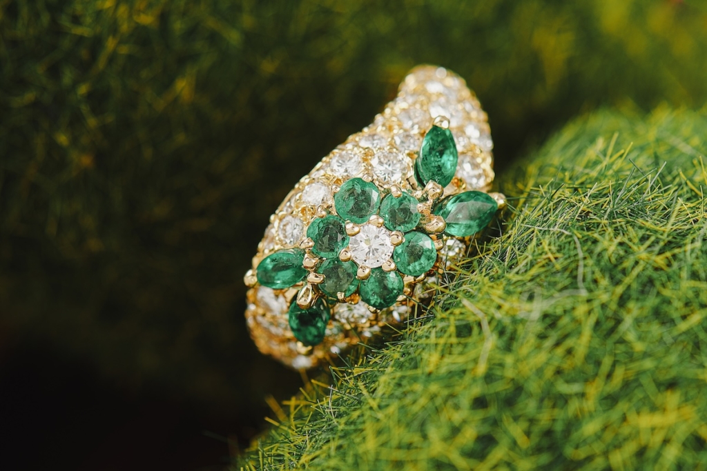 Yellow gold, emerald, and diamond ring by Graff, one of the world's top jewelry brands in terms of extravagant gem-setting