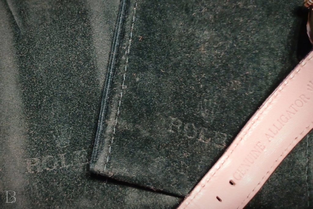 Two Rolex pouches and a gator strap