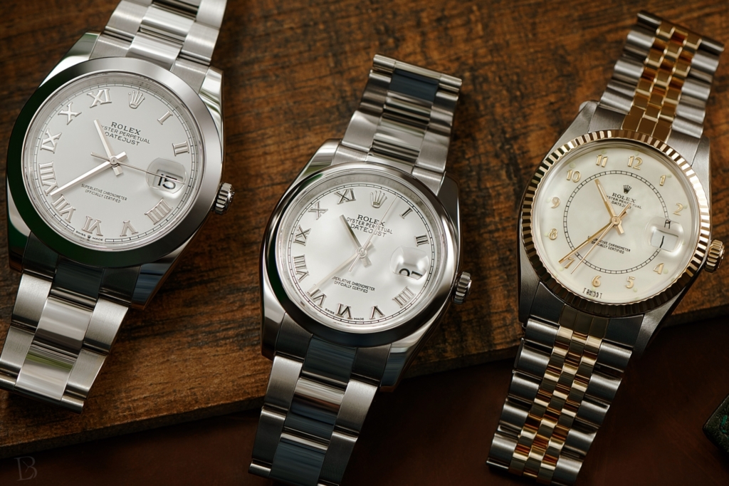Three Rolex Datejusts with different AR coating