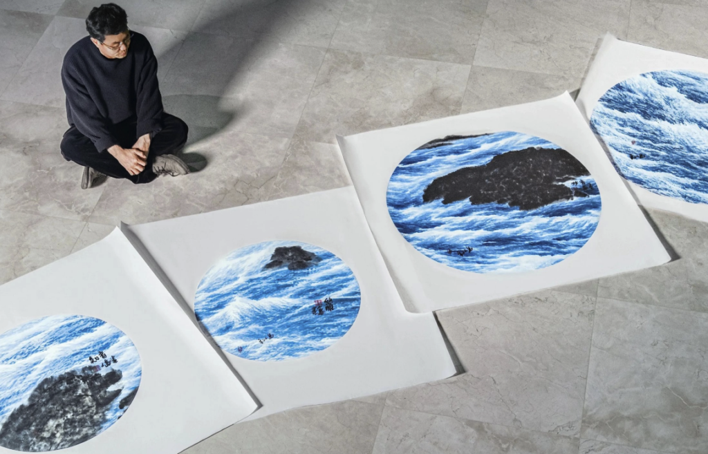 Rendao Liu with his 4 maritime dial designs for his 2026 Ulysse Nardin Classico collab