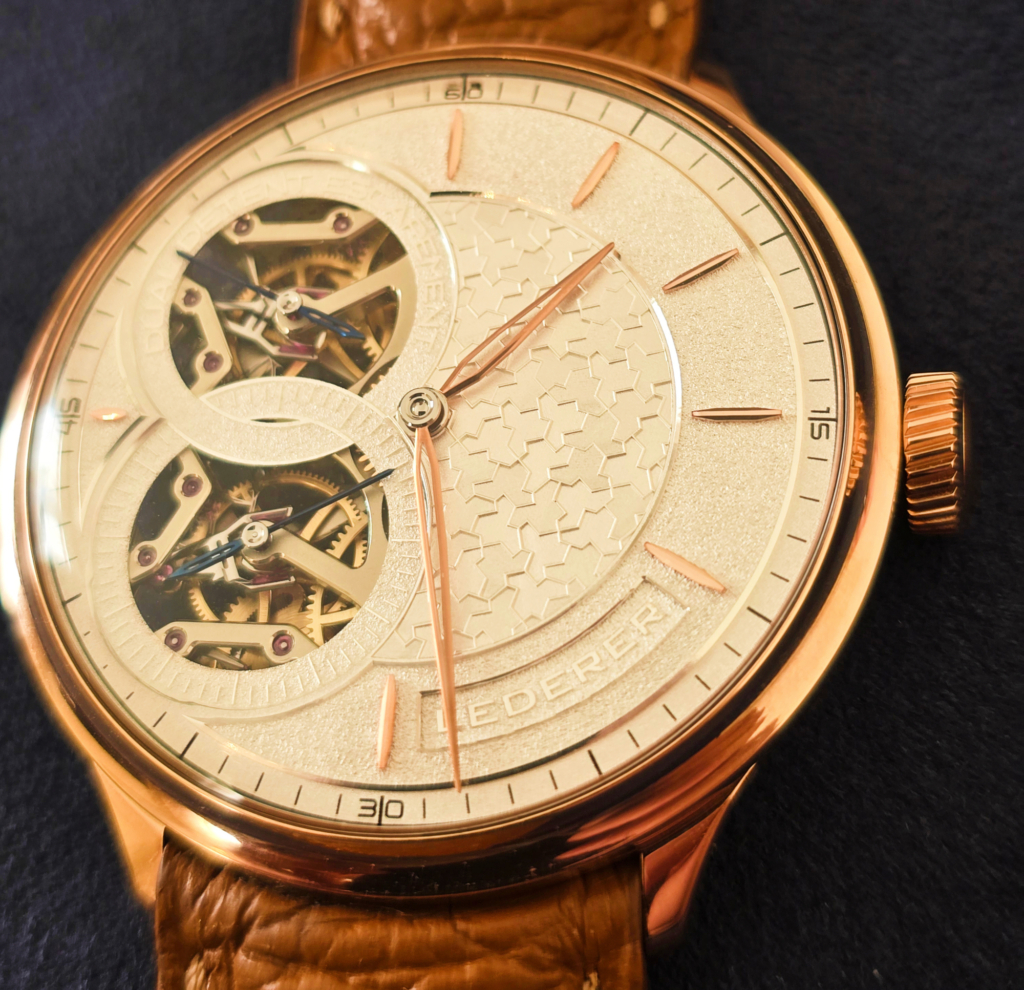 Lederer CIC 44 with silver dial and red gold case
