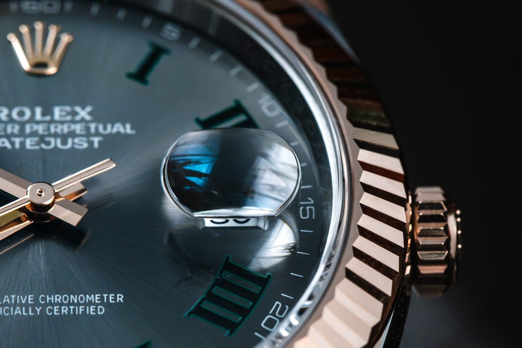 What is a Rolex Cyclops? Close-up of the magnifying lens over the date window of a Rolex Datejust watch.