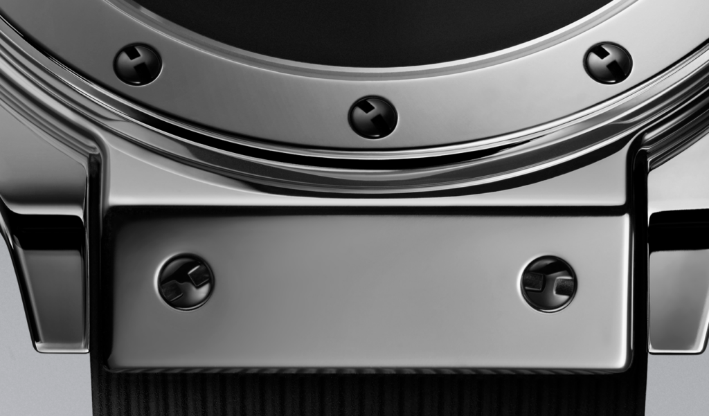 The titanium H-shaped screws on the 2026 Hublot Classic Fusion Tributo White Gold are blackened.