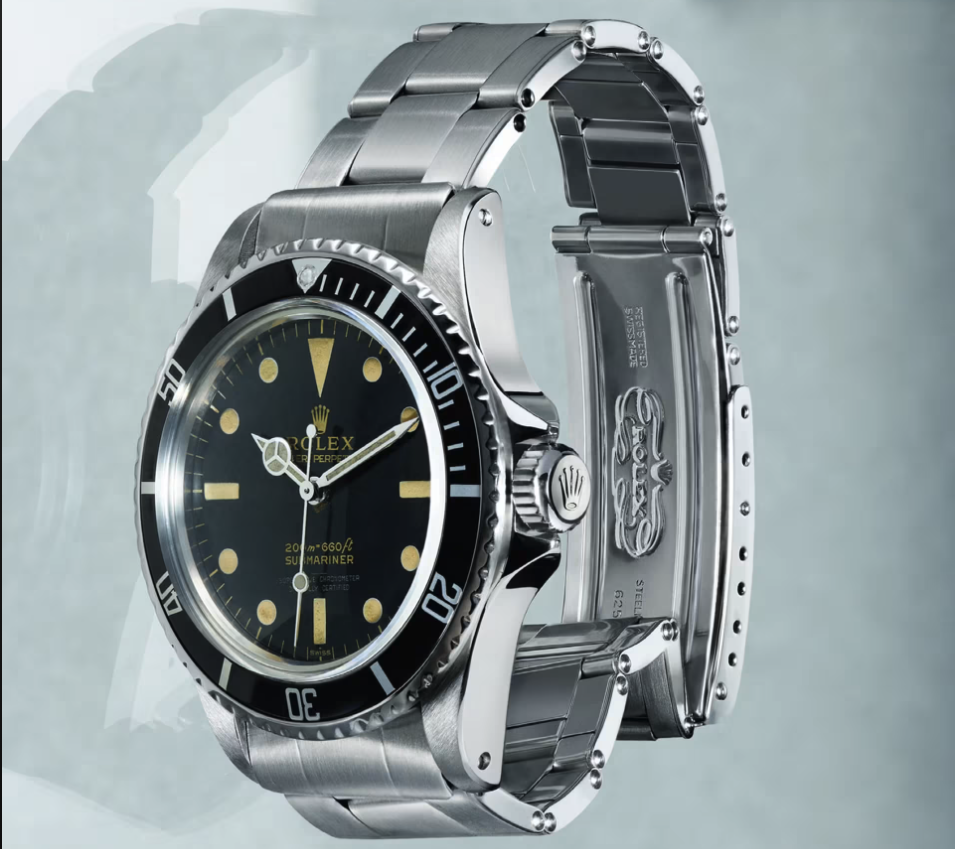 Ref. 5512 with gilt dial and pointy crown guards (PCG).
